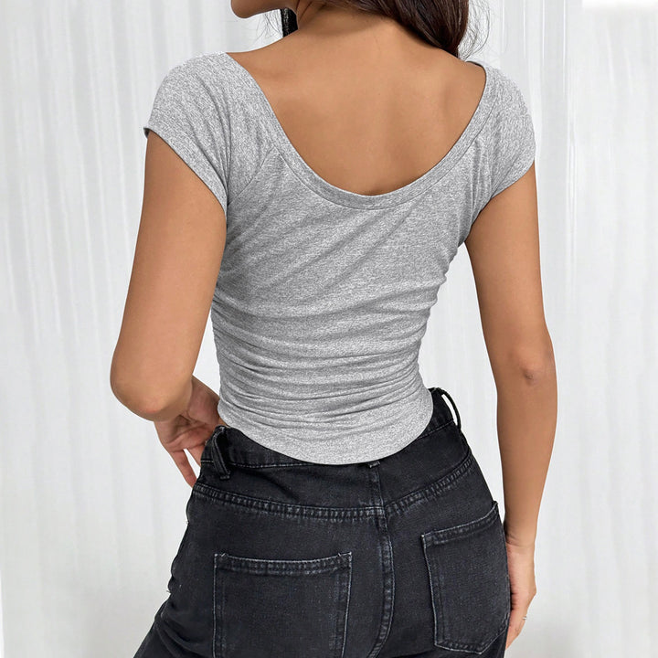 Dame tætsiddende crop top med folder og rund hals Stilla