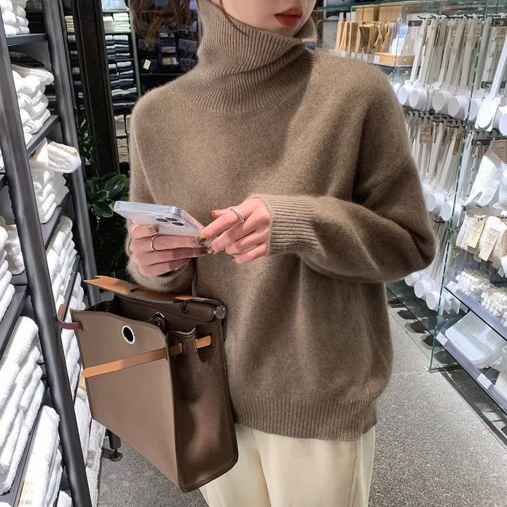 Kvinderne cashmere rullehals sweater med en løs pasform og elegant tekstur Stilla