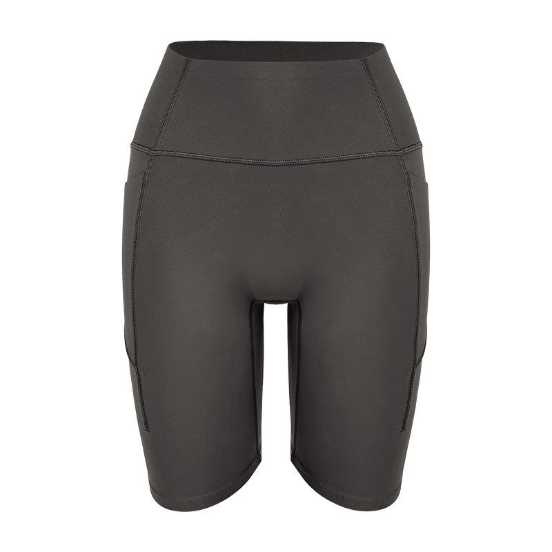 Dame højtaljede sports shorts med praktiske sidelommer og ekstra fleksibilitet Stilla