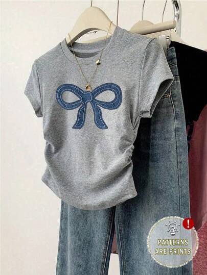 Dame Crop-T-Shirt med tætsiddende snit og moderne design Skovae