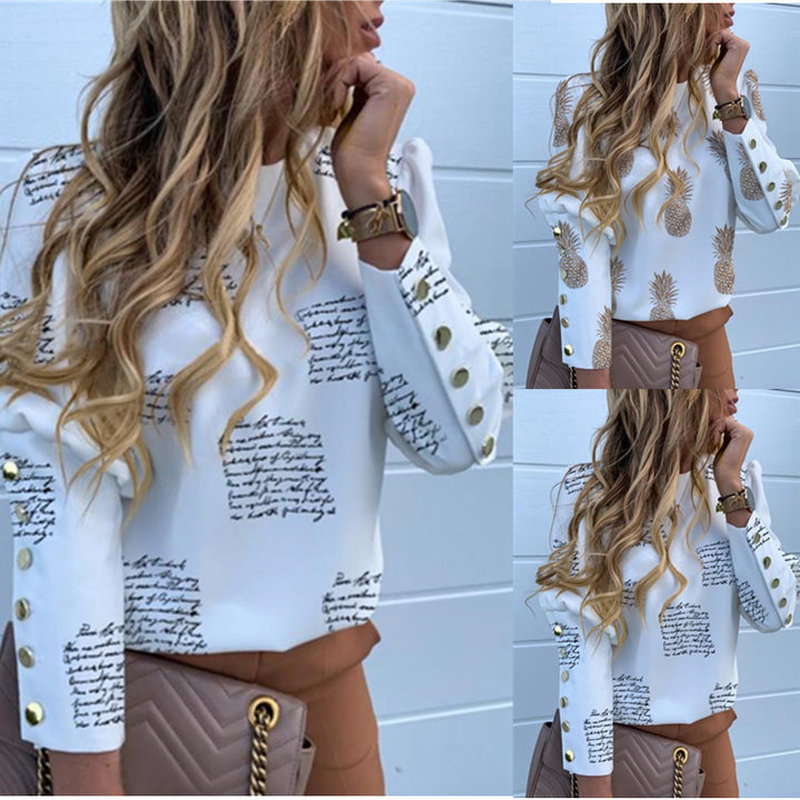 Damebluse med tropisk ananasmotiv og elegante knapdetaljer Stilla
