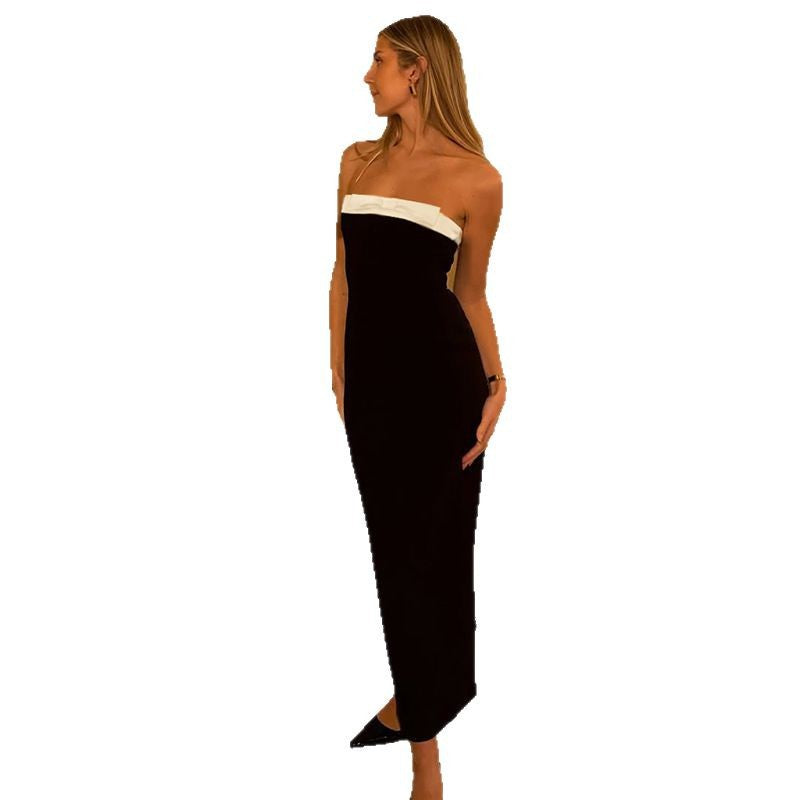 Dame cocktailkjole med off-shoulder design og elegant farveaccent Skovae