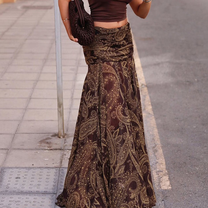 Dame skirt with asymmetrical hem and paisley pattern Skovae