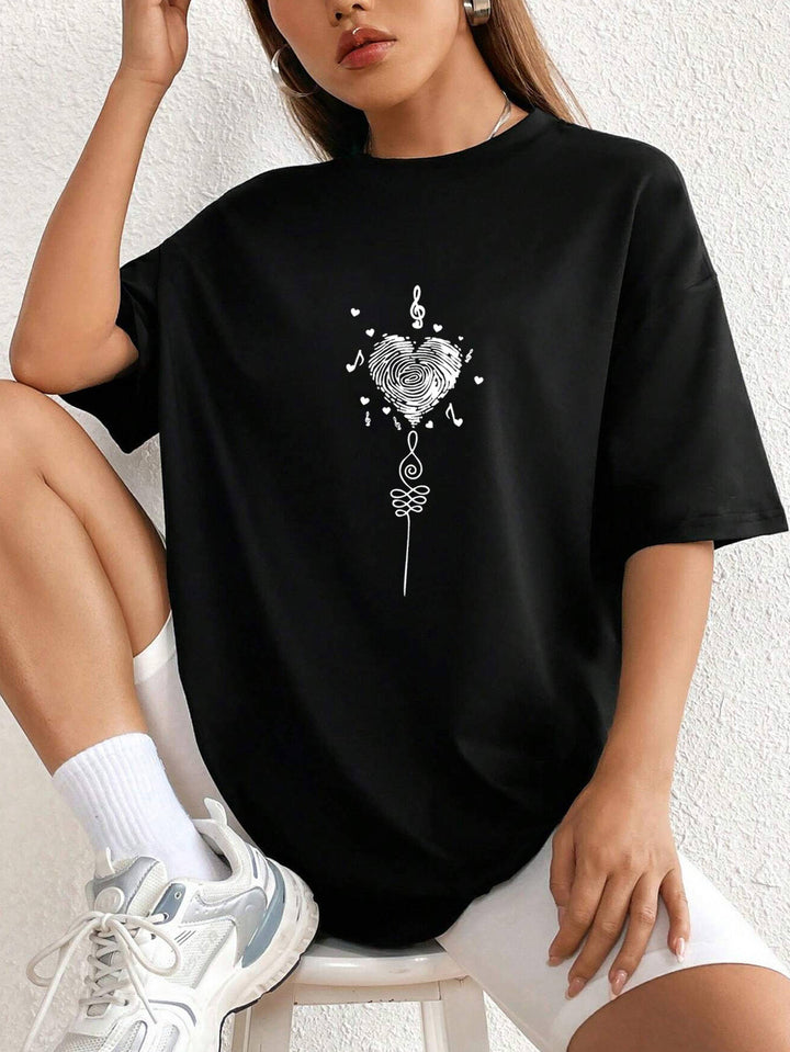 Dame Oversized T-Shirt med kreativt hjerte-design Stilla
