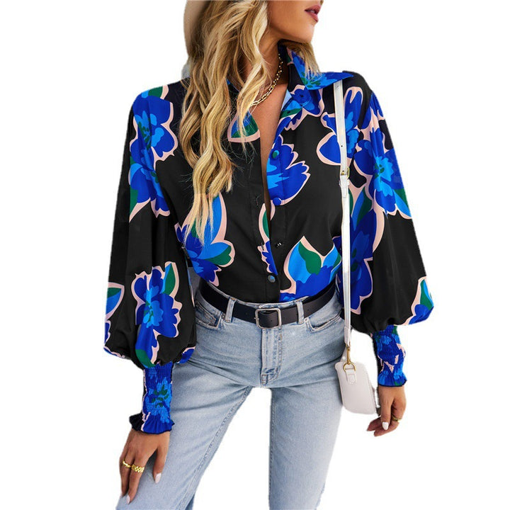 Damebluse med blomsterprint og klokkeærmer Stilla