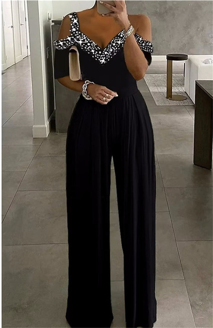 Dame Elegant Jumpsuit med dyb V-udskæring og flæseærmer Stilla