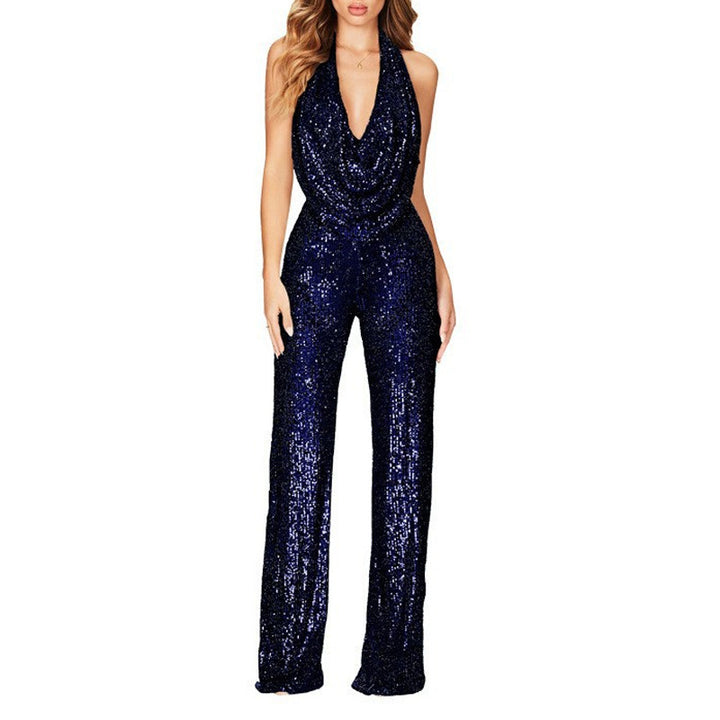 Dame glamourøs jumpsuit med glitrende pailletter og dyb udskæring Stilla