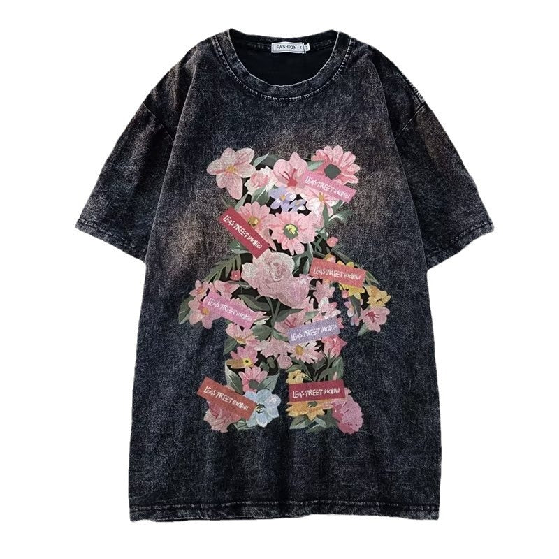 Dame Oversized T-shirt med floral grafisk tryk og afslappet snit Stilla