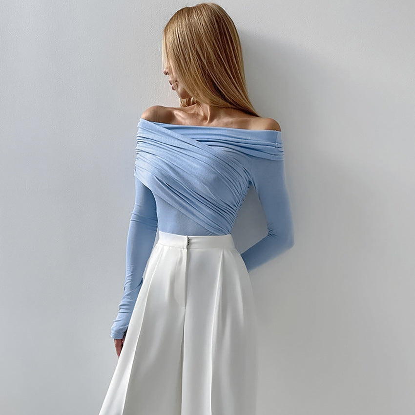 Dame Langærmet top med afslappet vikledesign og elegante flæsedetaljer Stilla