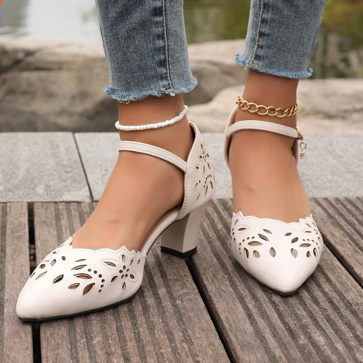 Dame Elegante Pumps med floral cut-out design og blokhælhøjde Stilla