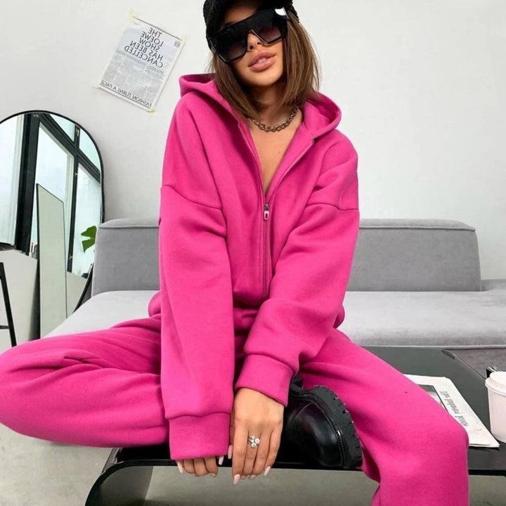 Kvinders sporty fleece jumpsuit med hætte og lynlås Skovae