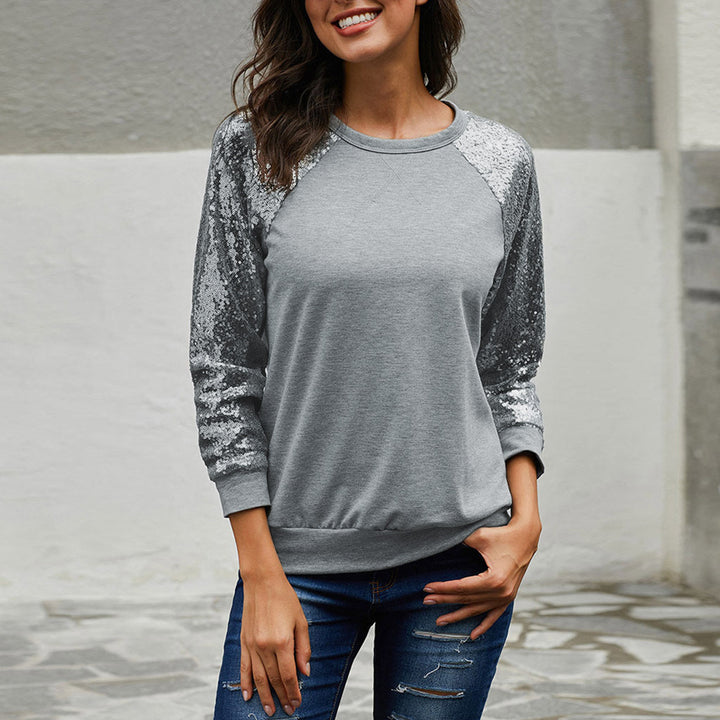 Dame sweatshirt med glitrende palietærmer og moderne snit Stilla