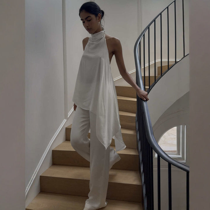 Dame elegant satineret heldragt med asymmetrisk snit Skovae