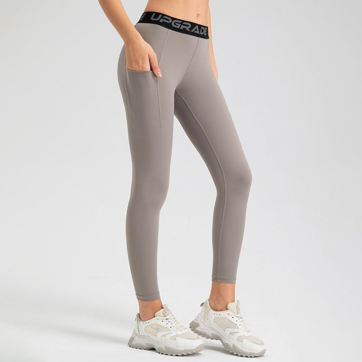 Dame Sporty High-Waist Leggings med praktiske sidelommer og fleksibel pasform Stilla