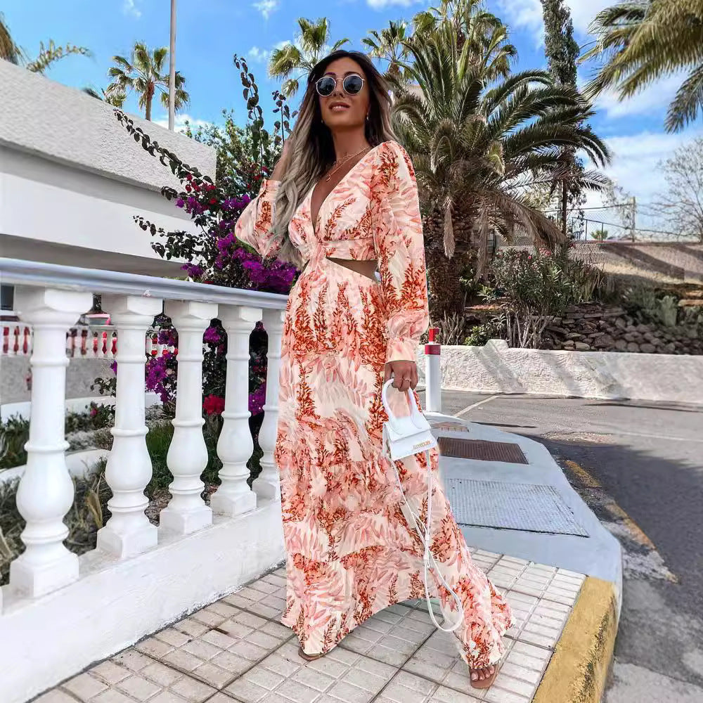Dame Maxi-kjole med florale cut-out-detaljer og voluminøse ærmer Stiila