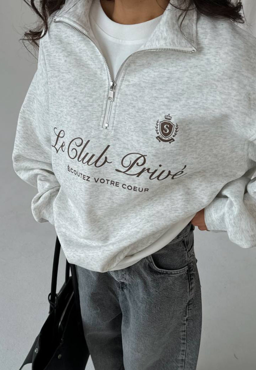 Kvinders afslappede pullover med halv lynlås og grafisk print Stilla