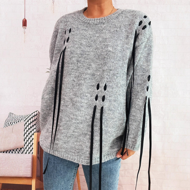 Dame stilfuld sweater med unikt snøredesign Stilla