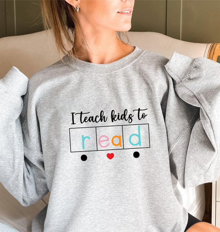 Kvinders sweatshirt med kreativt undervisningsmotiv Stilla