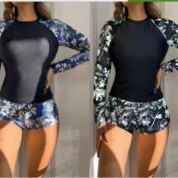 Dame Rashguard-sæt med urban blomstret design og sporty shorts Stilla