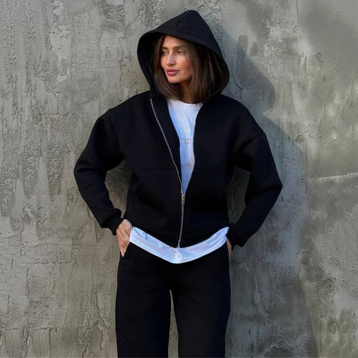 Kvinders sporty fleece jumpsuit med høj krave og praktiske lommer Skovae