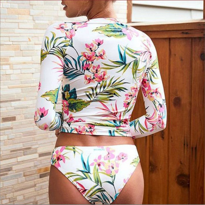 Dame UV-beskyttelses badedragt med lange ærmer og blomstertryk Stilla