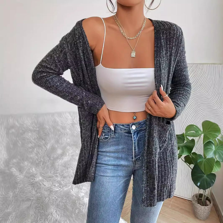 Dame cardigan med struktureret striklook og praktische lommer Stilla