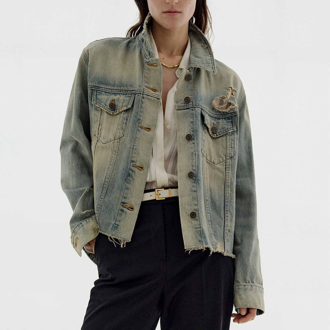 Dame mode denimjakke i vintage-stil med afslappet snit og frynset detaljer Skovae