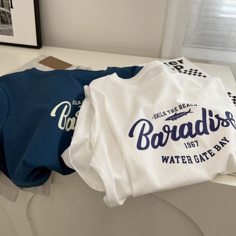 Dame T-shirt med begrundet Paradise-tryk og løs pasform Stilla