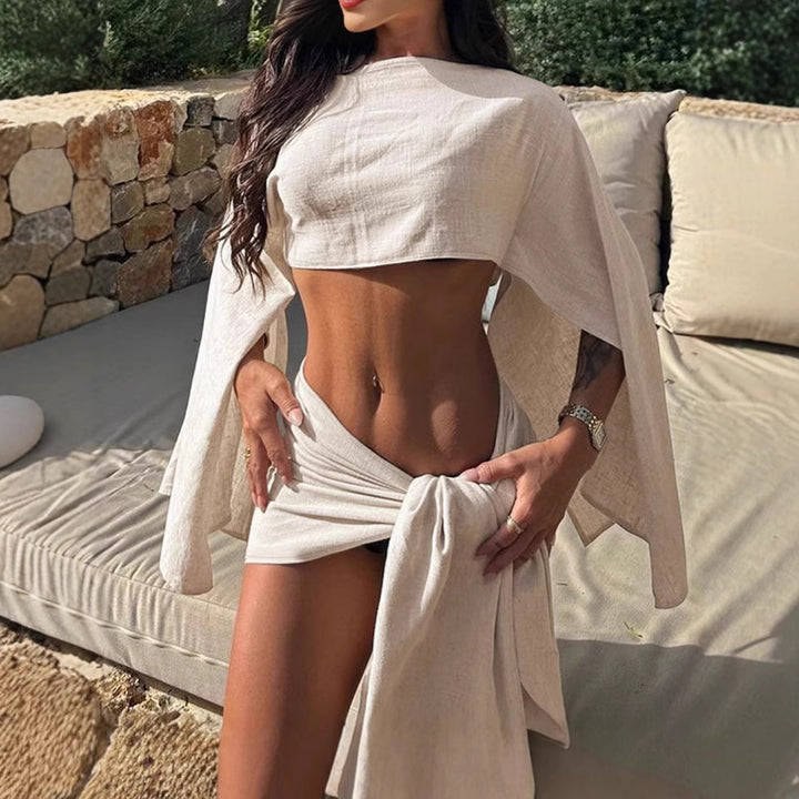 Dame indpakningsbluse med asymmetrisk snit og elegante ærmer Skovae
