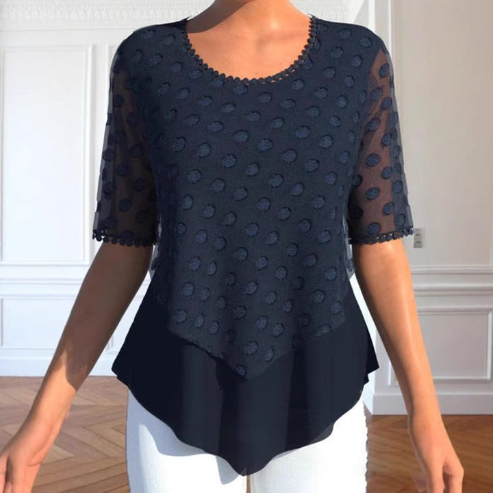 Damebluse med elegante strukturerede detaljer og modeindsats Stilla