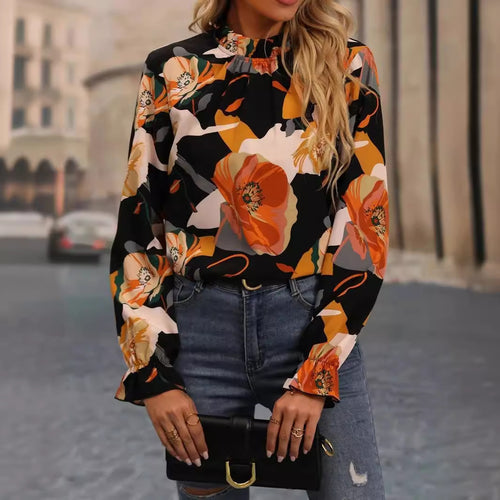 Damebluse med blomsterdesign og elegante flæser Stilla