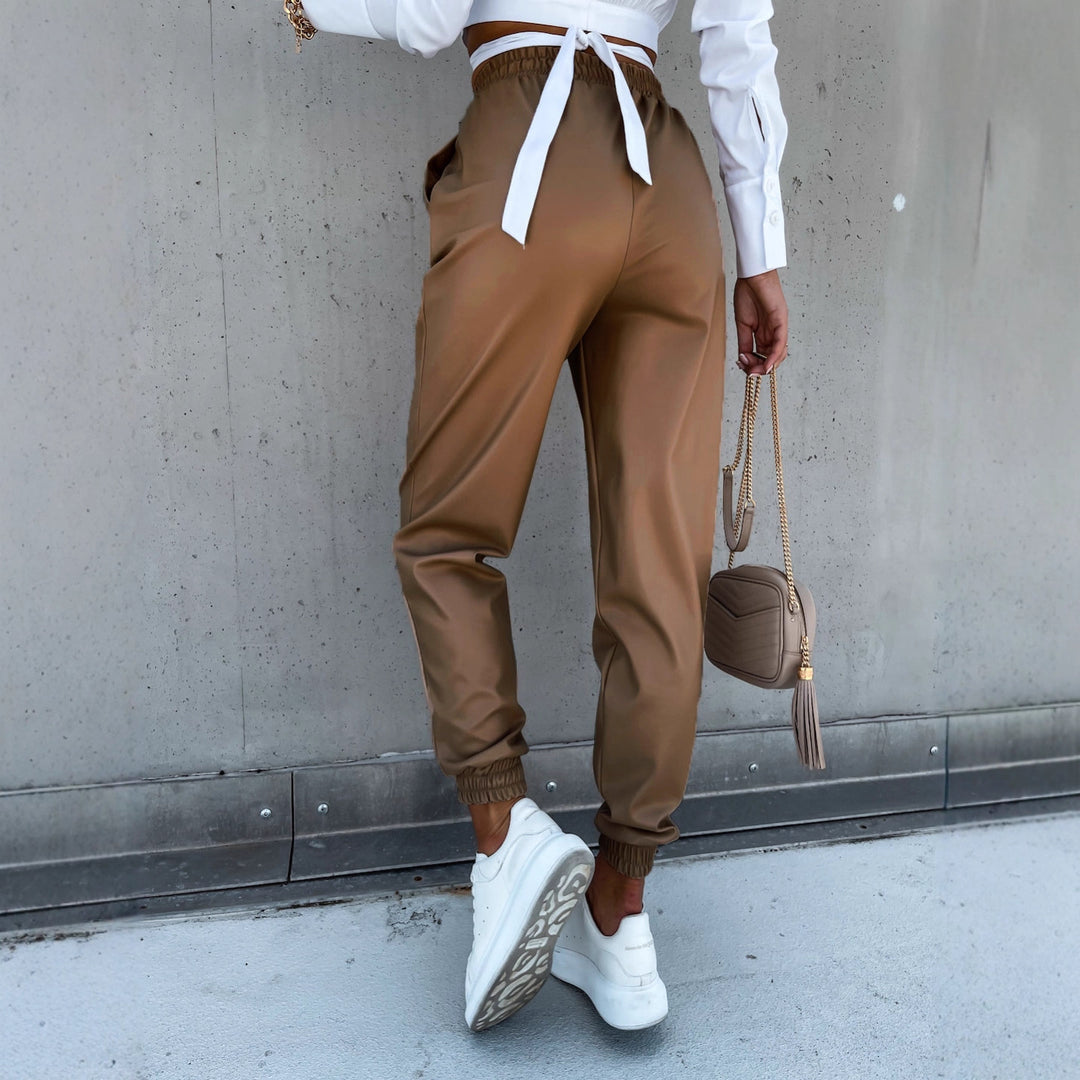 Dame komfortable joggebukser i sportstil med elastisk talje og lommer Skovae