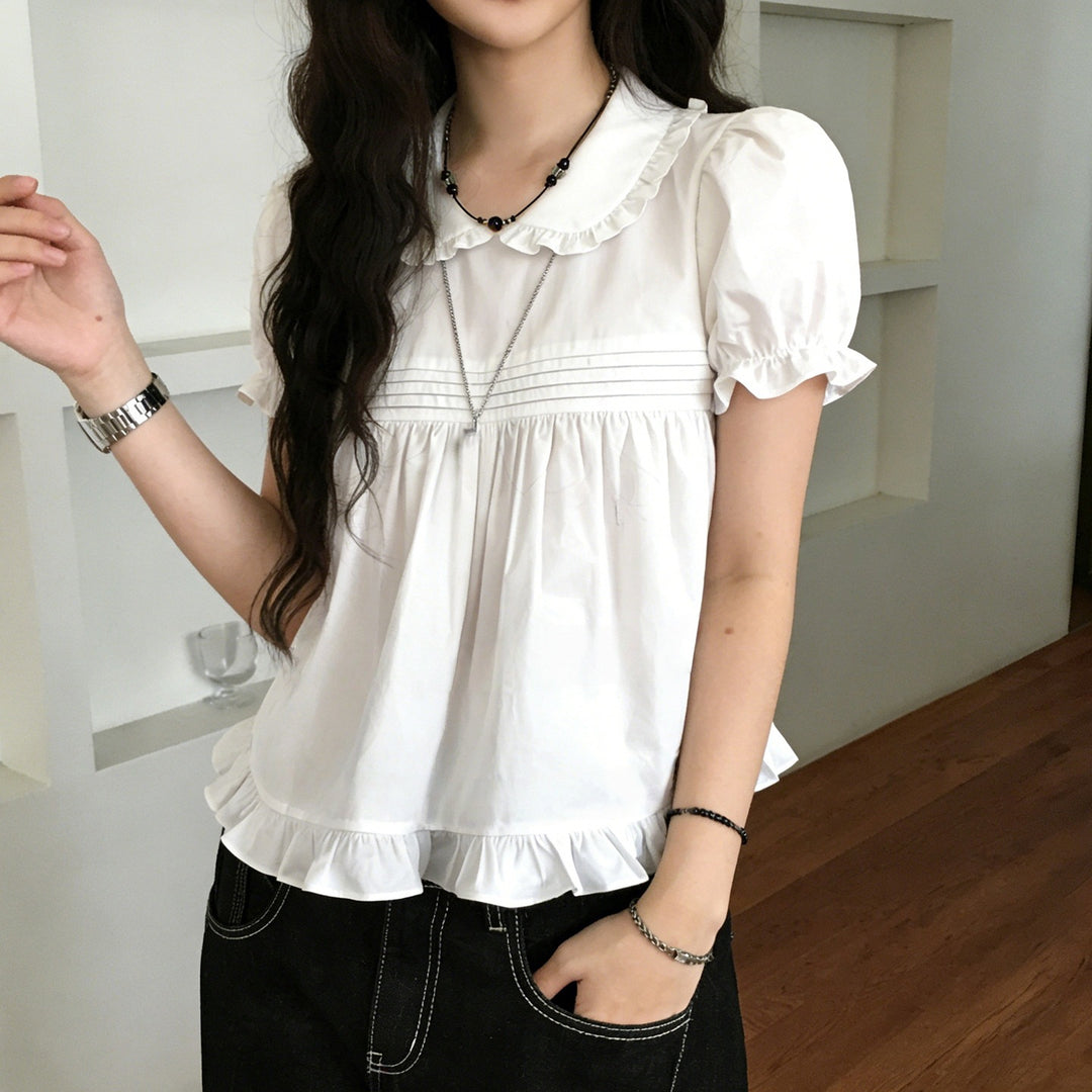 Damebluse med rynker og elegant krave Skovae