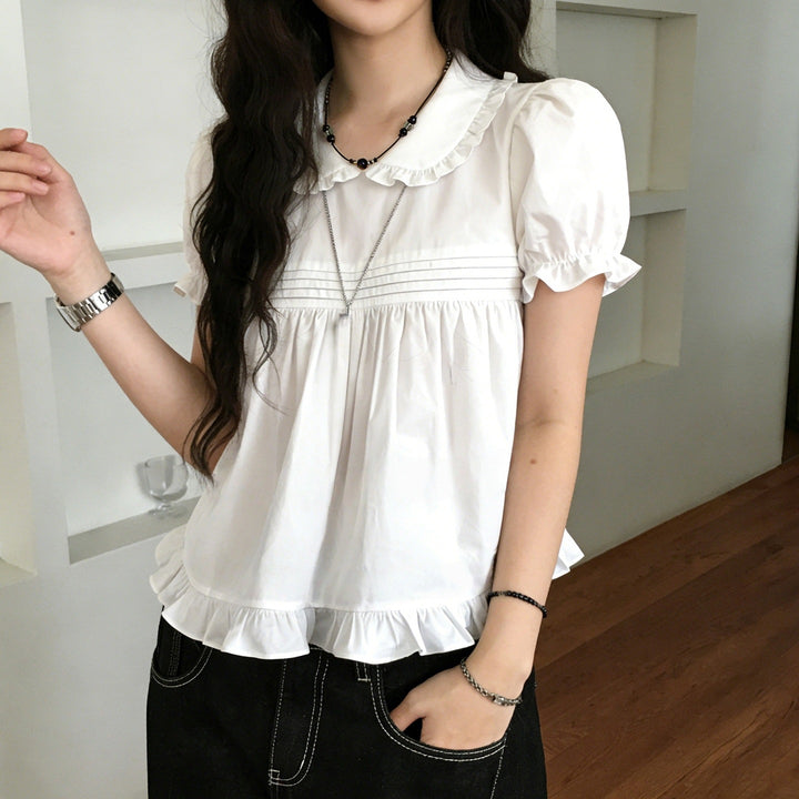 Damebluse med rynker og elegant krave Skovae