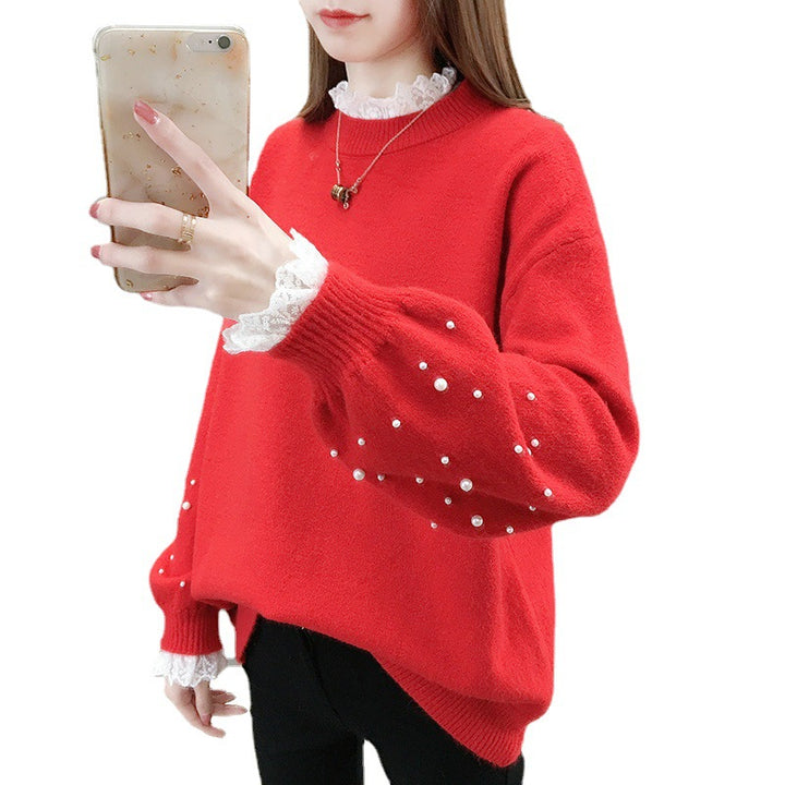 Dame trendy strikpullover med perledetaljer og voluminøse ærmer Stilla
