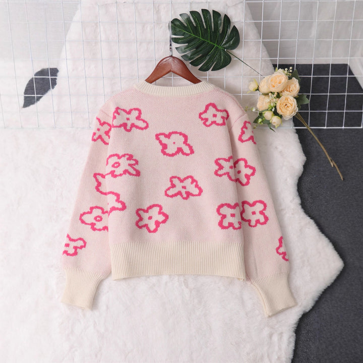 Kvinders cardigan med blomsterdesign og knapdetaljer Stilla