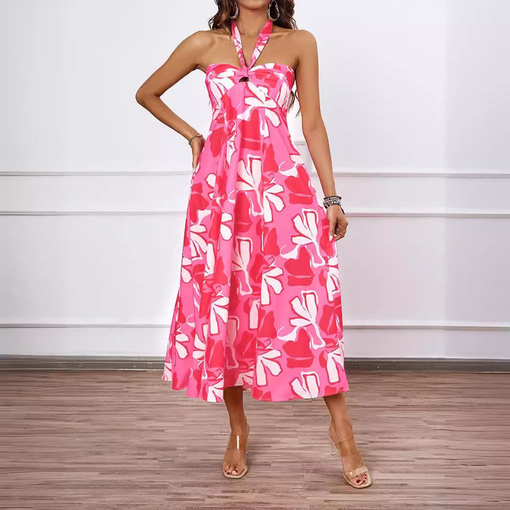 Dame maxikjole med skulderfri design og floral twist Stilla
