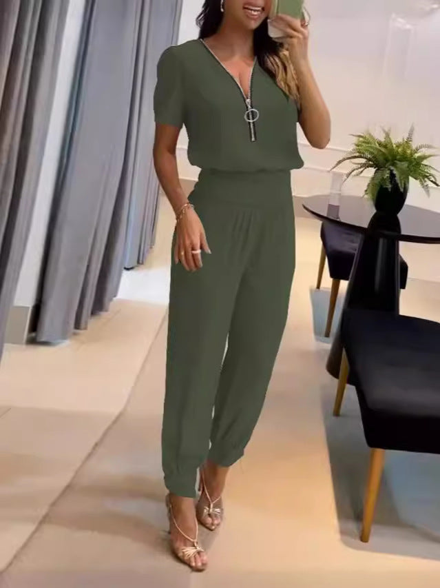 Dame jumpsuit med højhævet krave og sidelukning Skovae