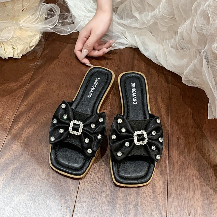 Dame Designer-sandaler med glamorøs sløjfedetalje og brusende strassdekorationer Stilla
