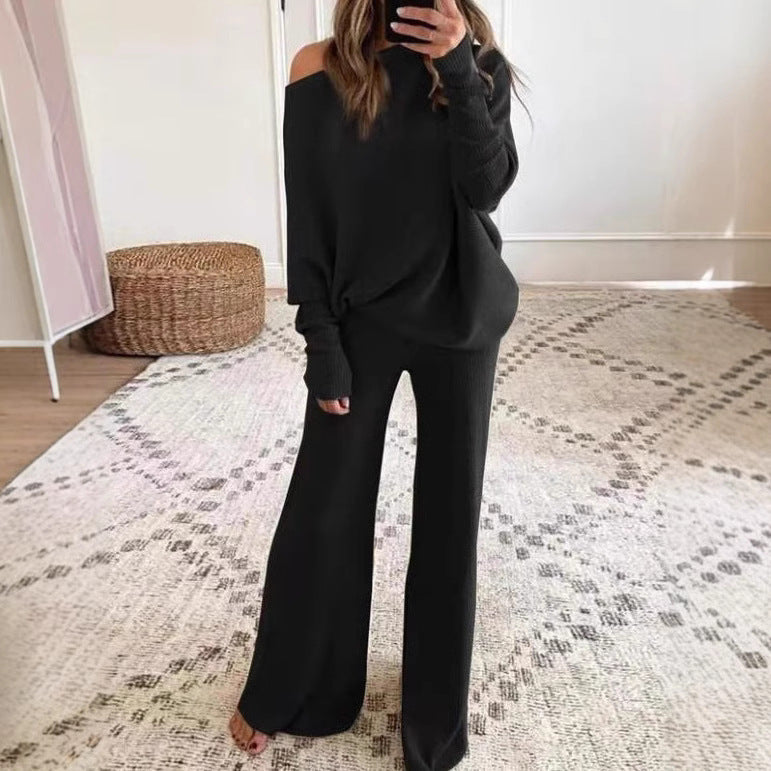 Dame strikdragt med afslappet pasform og off-shoulder design Stilla