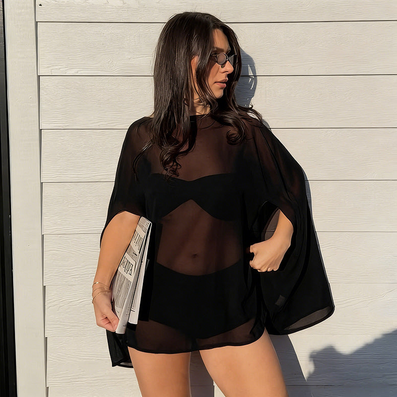 Dame elegant transparent poncho med makramee-detaile Skovae