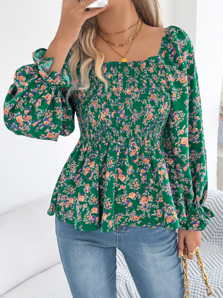 Damebluse med bred pasform og florale detaljer Stilla