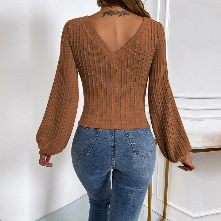 Kvinders strikket bodysuit med V-hals og elegante puffærmer Stilla