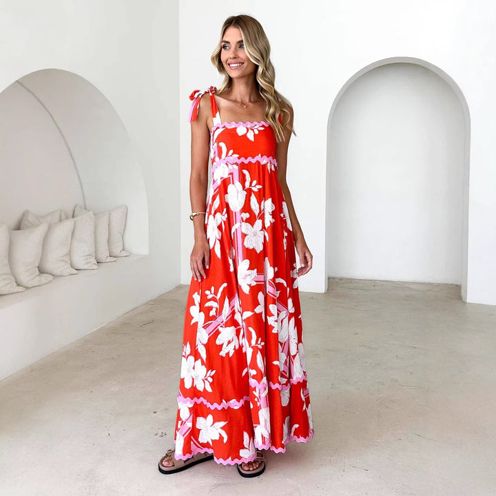 Kvinders maxi kjole med legende stropdesign og elegant print Stilla