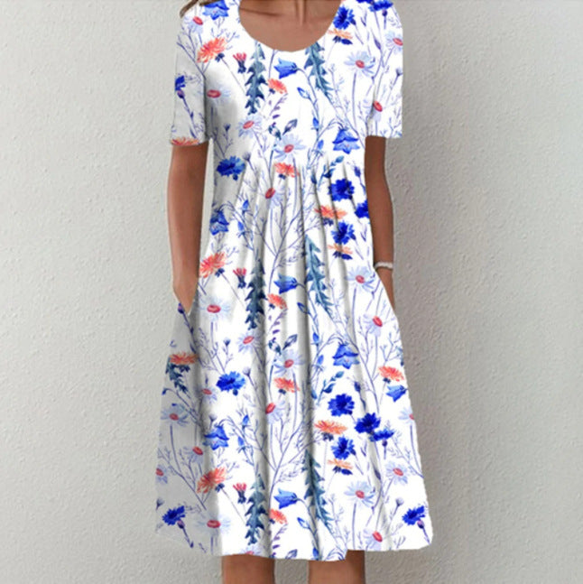 Dame fritidskjole med blomstret design og praktiske lommer Stiila