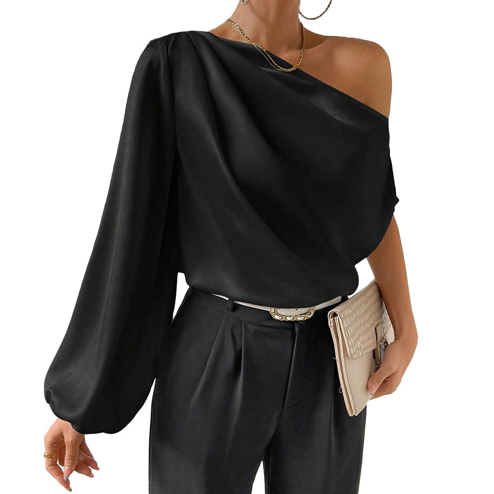 Kvindernes asymmetriske top med elegante puffærmer Stilla
