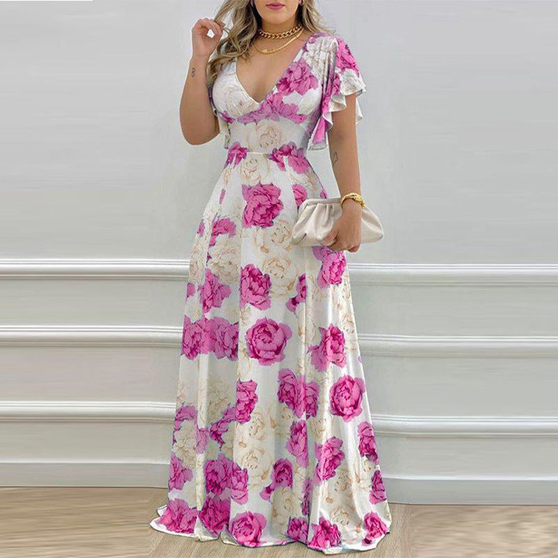 Dame Maxikjole med floralt design og elegante flæsedetaljer Stilla