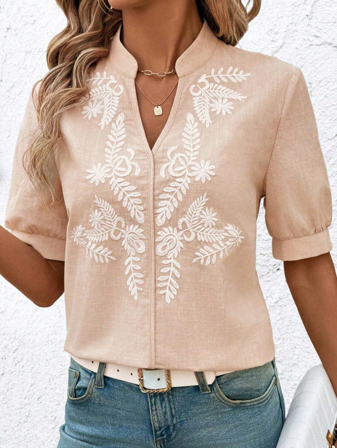Dame elegant kortærmet bluse med blomstret broderimønster Stilla
