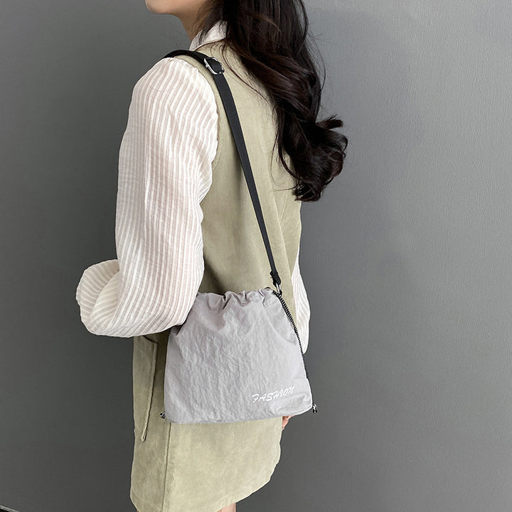 Femme Alsidig Snørebånd Bucket Bag Stilla