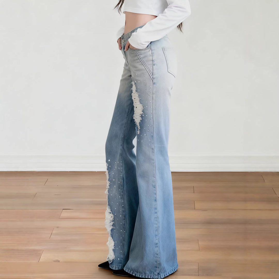 Dame Schlagjeans med moderigtige destroyed-detaljer og komfortabel pasform Skovae